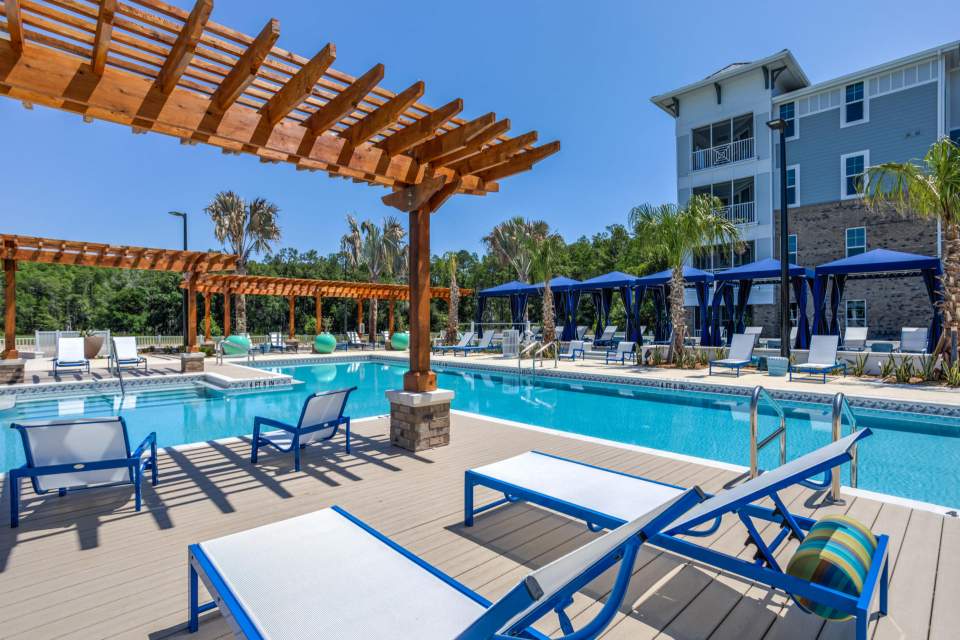 Deluxe pool with tranquil lounge area